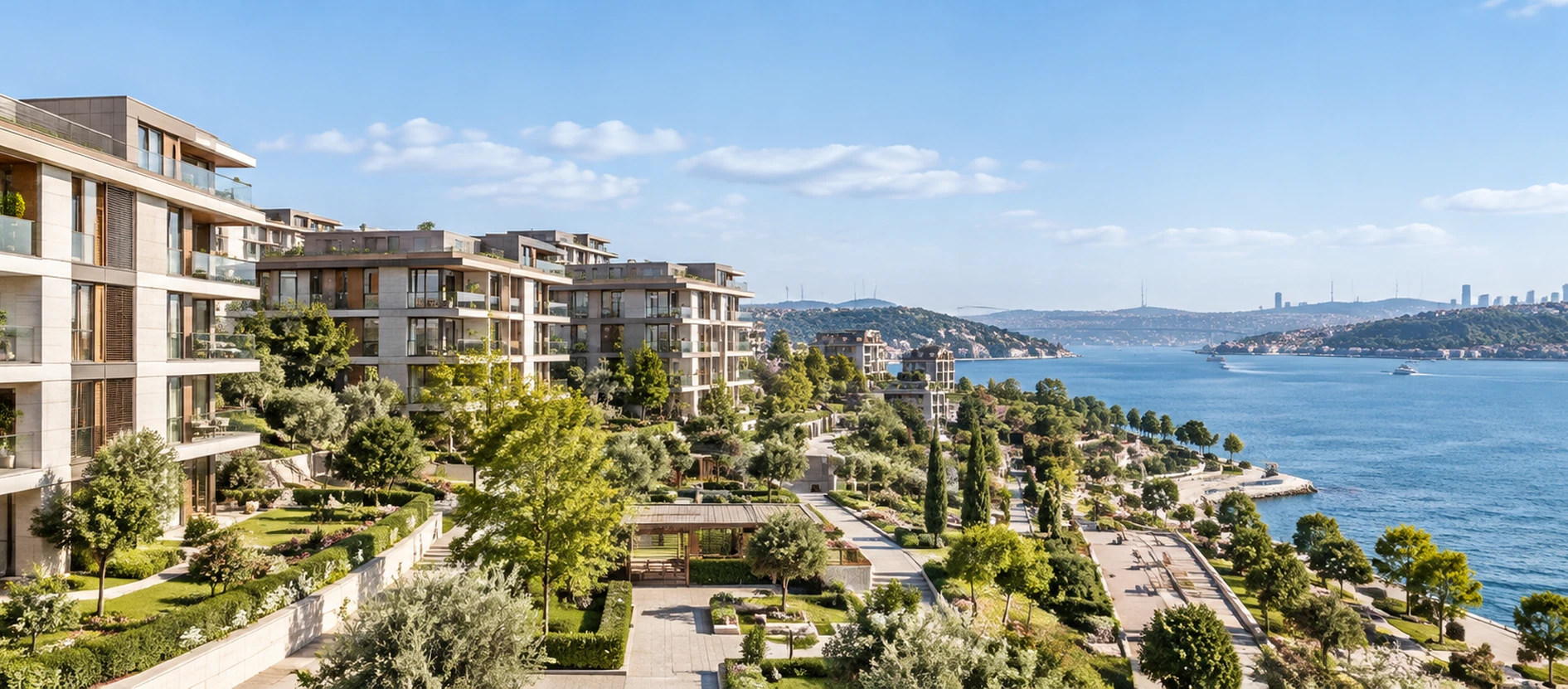 Gün batımında, yeşil alanlarla çevrili modern konutlar ve kıyı manzarası